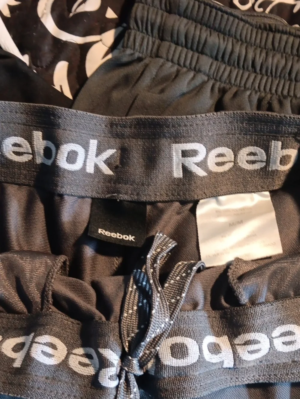 Reebok Men’s Black and Gray Athletic Shorts with Reflective Trim